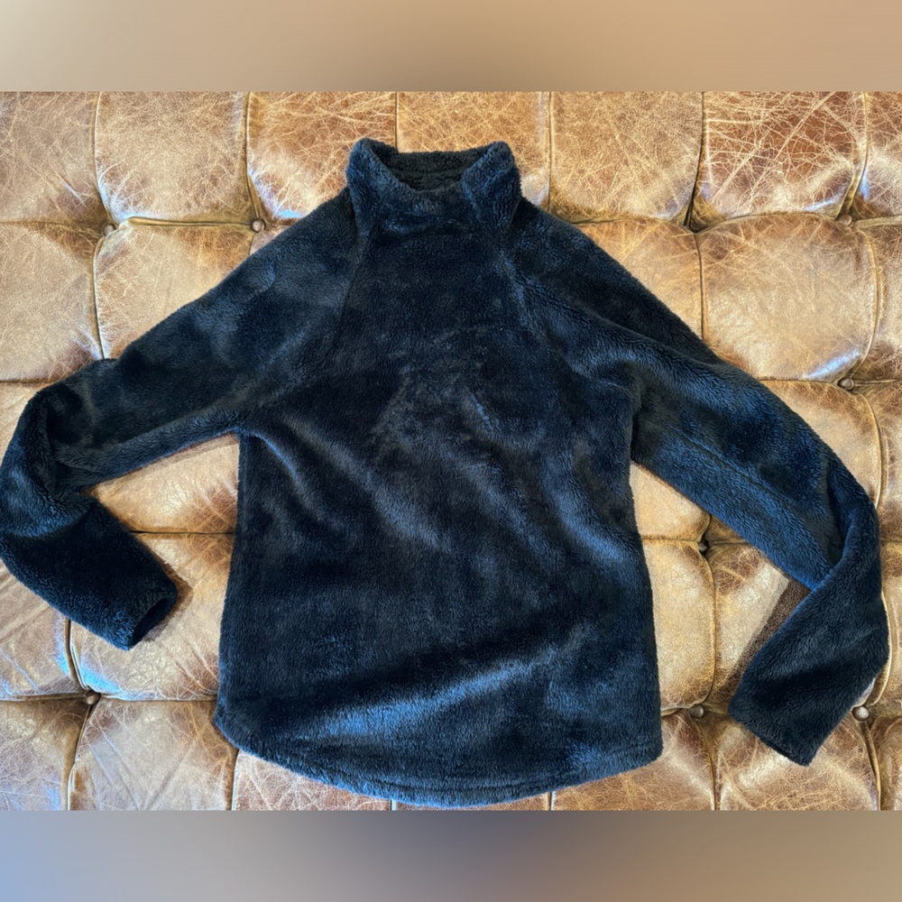Fuzzy black pullover with small turtleneck